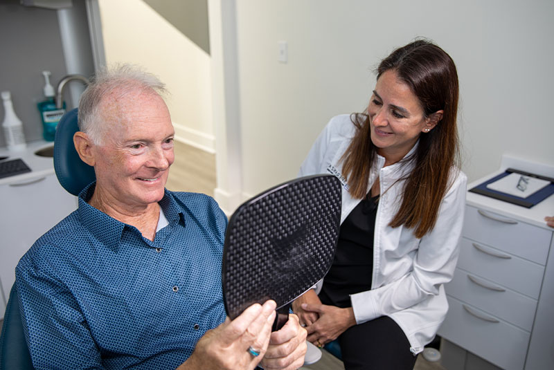 patient looking into mirror