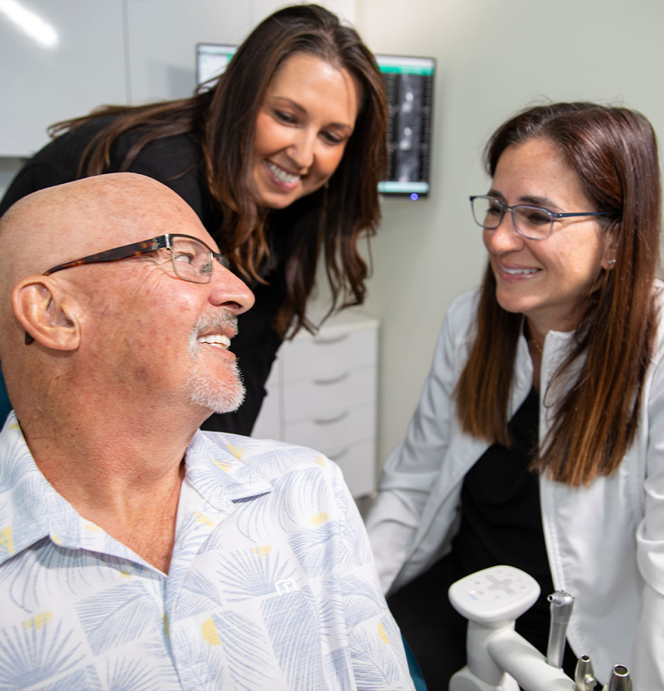 doctors consulting with patient